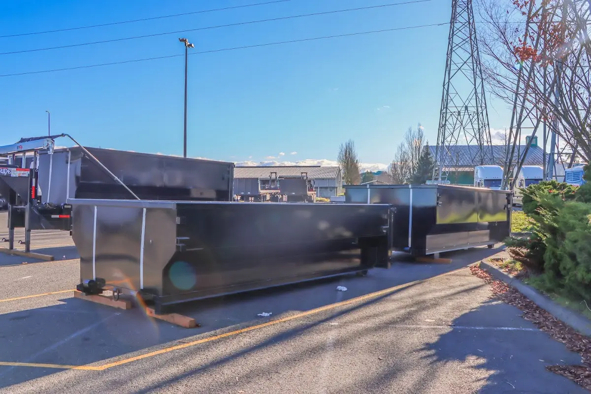 Roll-off dumpster ready for waste disposal at job site for Roofing Dumpster Rental in Rainsville